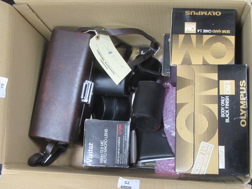 Lot 75 - Olympus OM2n camera body with Tokina 28-70mm 1:...