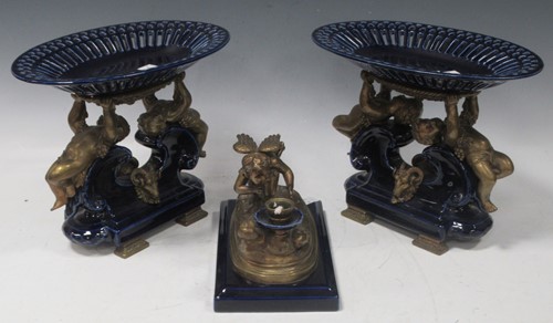 Lot 8 - A continental style table garniture comprising...