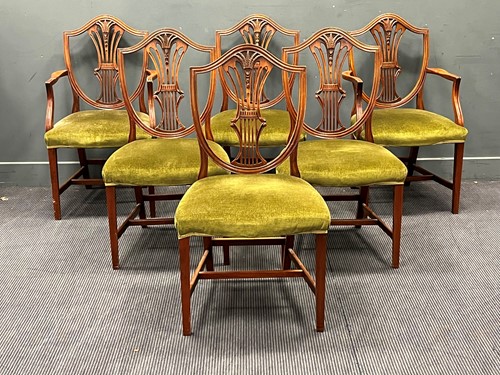 Lot 545 - A set of six Hepplewhite style mahogany shield...
