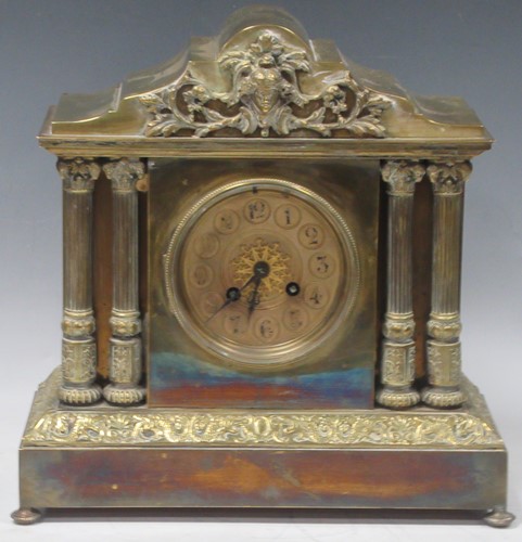 Lot 86 - An Edwardian brass case mantel clock with gong...