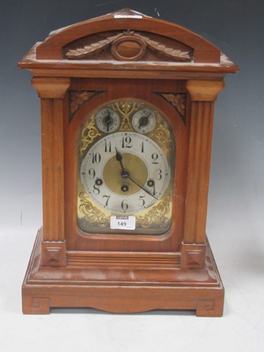 Lot 149 - An Edwardian walnut case gong chiming mantel...