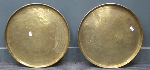 Lot 154 - Two very large incised decorative brass trays,...