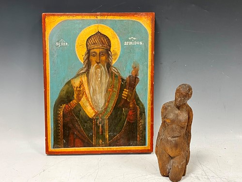 Lot 21 - A late 19th or 20th century Greek painted wood...