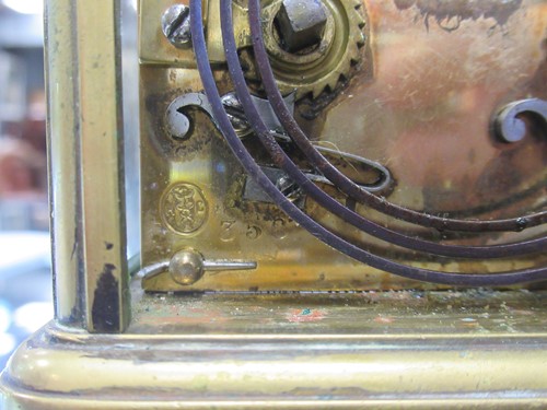 Lot 53 - A French brass carriage clock by Rollin, with...
