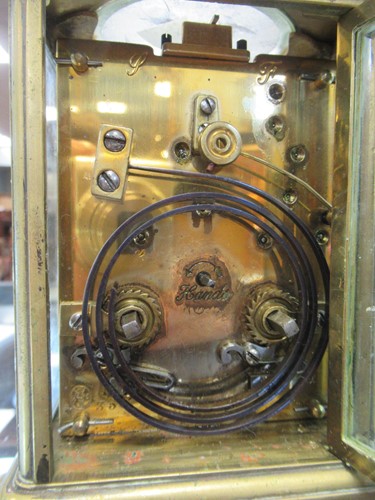 Lot 53 - A French brass carriage clock by Rollin, with...