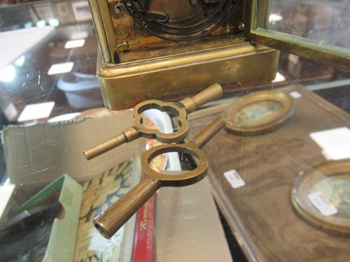 Lot 53 - A French brass carriage clock by Rollin, with...