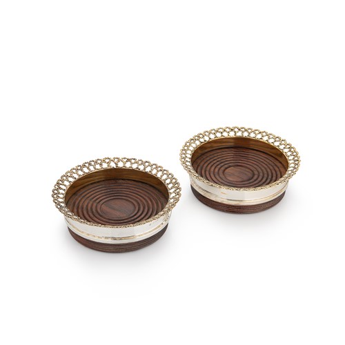 Lot 672 - A pair of Elizabeth II parcel gilt bottle coasters, mark of Stuart Devlin