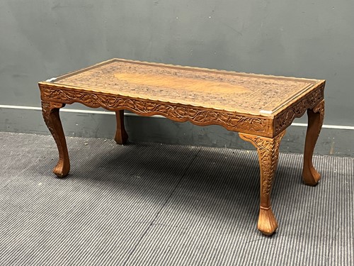 Lot 538 - A carved wood Indian coffee table, 20th...