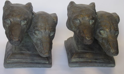 Lot 62 - A pair of bronzed terracotta models of...