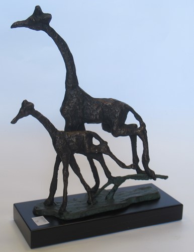 Lot 13 - A bronzed metal model of two galloping...