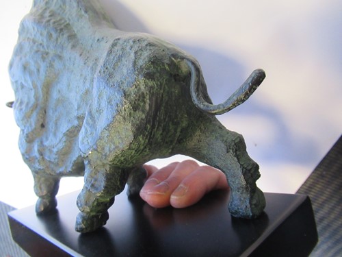 Lot 12 - A bronzed metal model of Taurus the bull after...