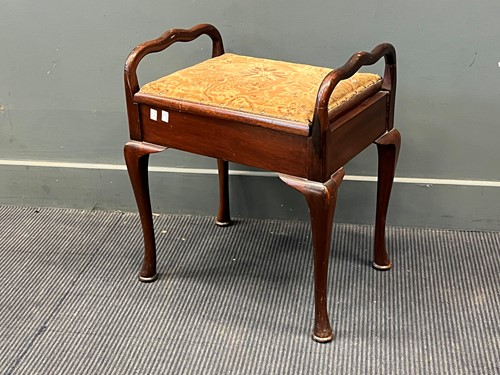 Lot 505 - A late 19th century piano stool, with lift up...