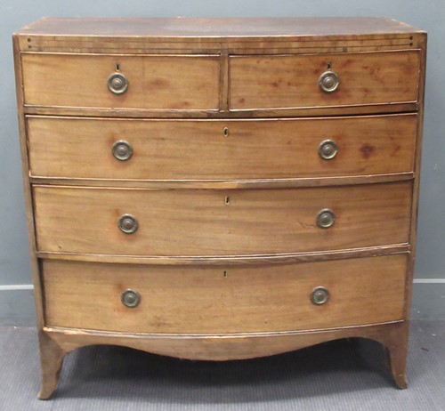 Lot 454 - A George III mahognay bow front chest of...