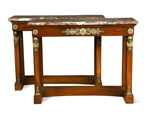 Lot 546 - A pair of Empire style mahogany console tables, 19th century