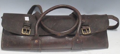 Lot 83 - An early 20th century buckled leather...