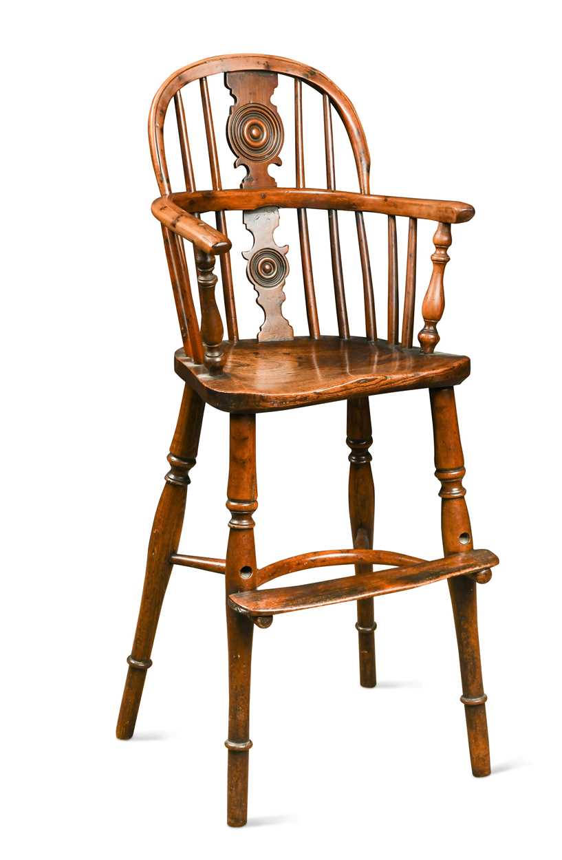 Lot 489 - A yew and elm child's Windsor high chair, 19th century