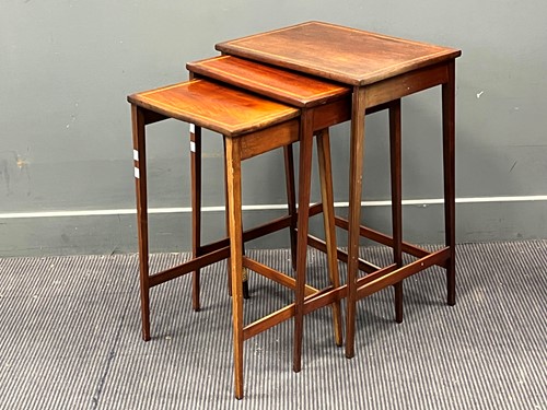 Lot 431 - A nest of three mahogany tables with satinwood...