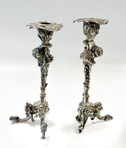 Lot 227 - A pair of Continental silver cast candlesticks,...