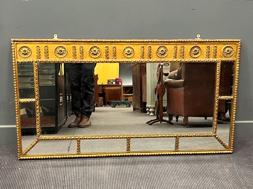 Lot 484 - A neoclassical style gilt painted sectional...