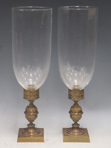 Lot 27 - A pair of Regency brass candle holders or...