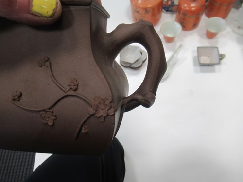 Lot 17 - A Chinese red stoneware teapot and cover,...