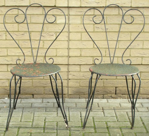 Lot 595 - Three teak steamer chairs together with two...