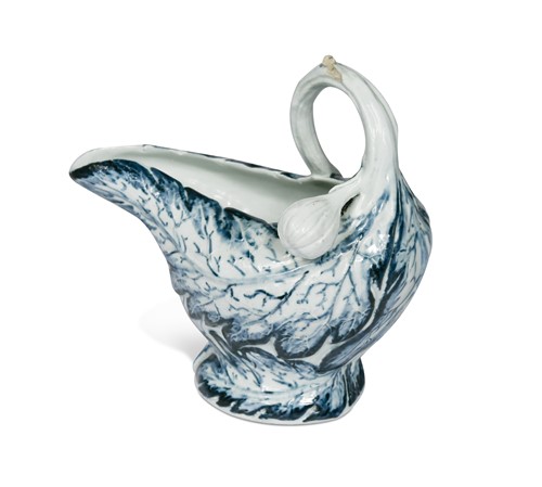 Lot 107 - A rare Chaffers Liverpool  cos lettuce moulded blue and white sauceboat, circa 1760