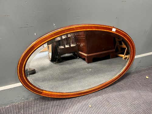 Lot 373 - Four oval wall mirrors, to include two...