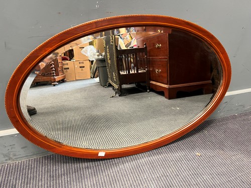 Lot 373 - Four oval wall mirrors, to include two...