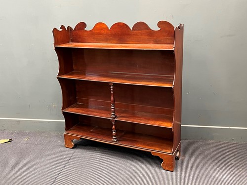 Lot 507 - A Regency style mahogany four tier open book...