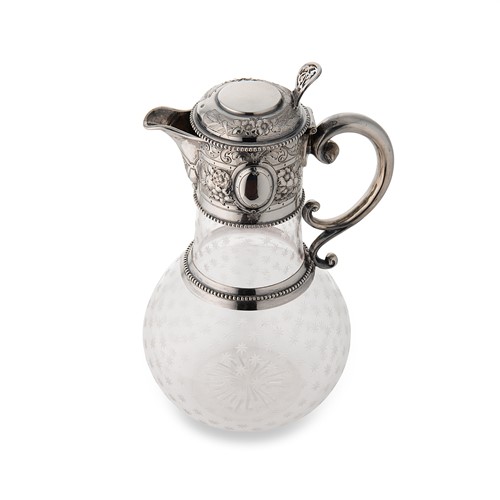 Lot 381 - A Victorian silver topped cut glass claret jug