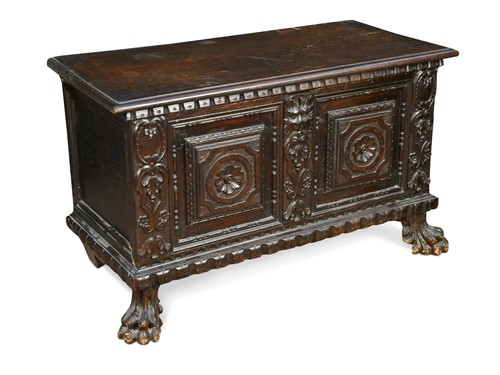 Lot 581 - An Italian carved walnut cassone, 18th century