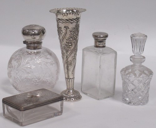 Lot 243 - A silver mounted glass dressing table bottle,...