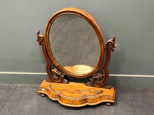 Lot 432 - A Victorian mahogany swing mirror, the oval...