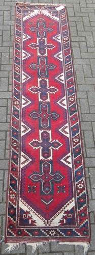 Lot 617 - A caucasian wool runner, with repeating...