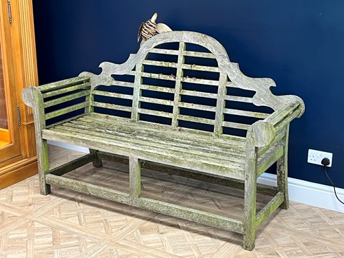 Lot 600 - A Lutyens style teak garden bench 105 x 168 x...