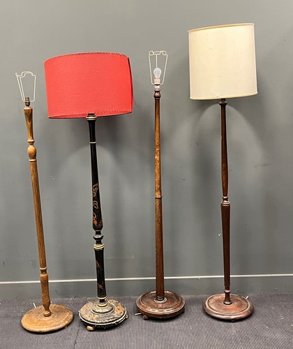 Lot 516 - A Chinoiserie black and gilt standard lamp...