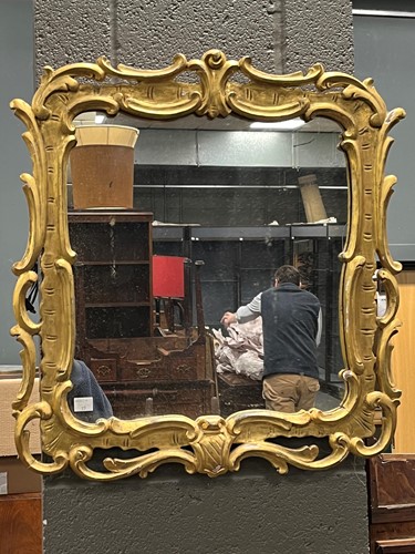 Lot 489 - A gilt wood scroll frame wall mirror, early...