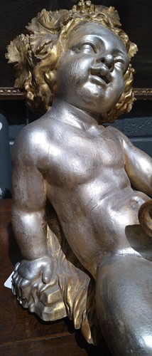 Lot 1 - A carved and gilded figure of a Bacchic putto, 19th or 20th century