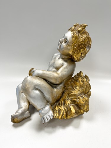 Lot 1 - A carved and gilded figure of a Bacchic putto, 19th or 20th century