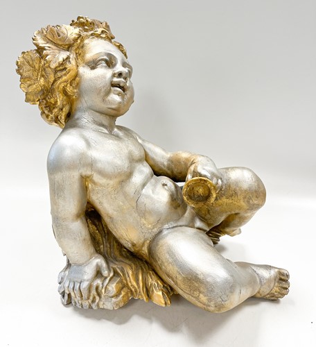 Lot 1 - A carved and gilded figure of a Bacchic putto, 19th or 20th century