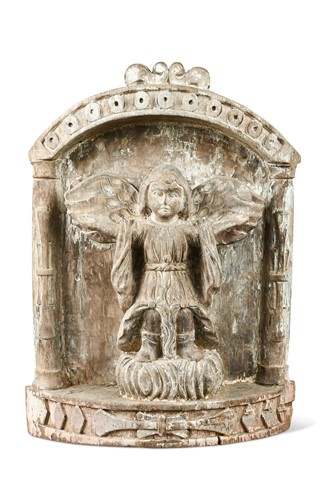 Lot 43 - A carved wood relief of an angel, late 16th or early 17th century