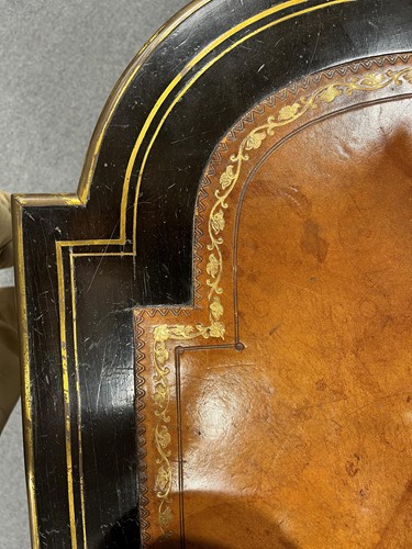 Lot 162 - A Louis XVI style leather-inset ebonised writing table
