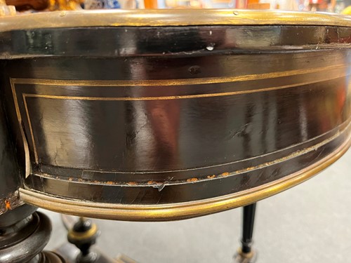 Lot 162 - A Louis XVI style leather-inset ebonised writing table