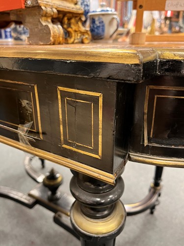 Lot 162 - A Louis XVI style leather-inset ebonised writing table