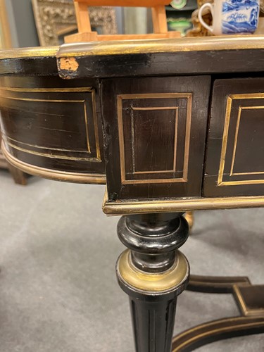 Lot 162 - A Louis XVI style leather-inset ebonised writing table