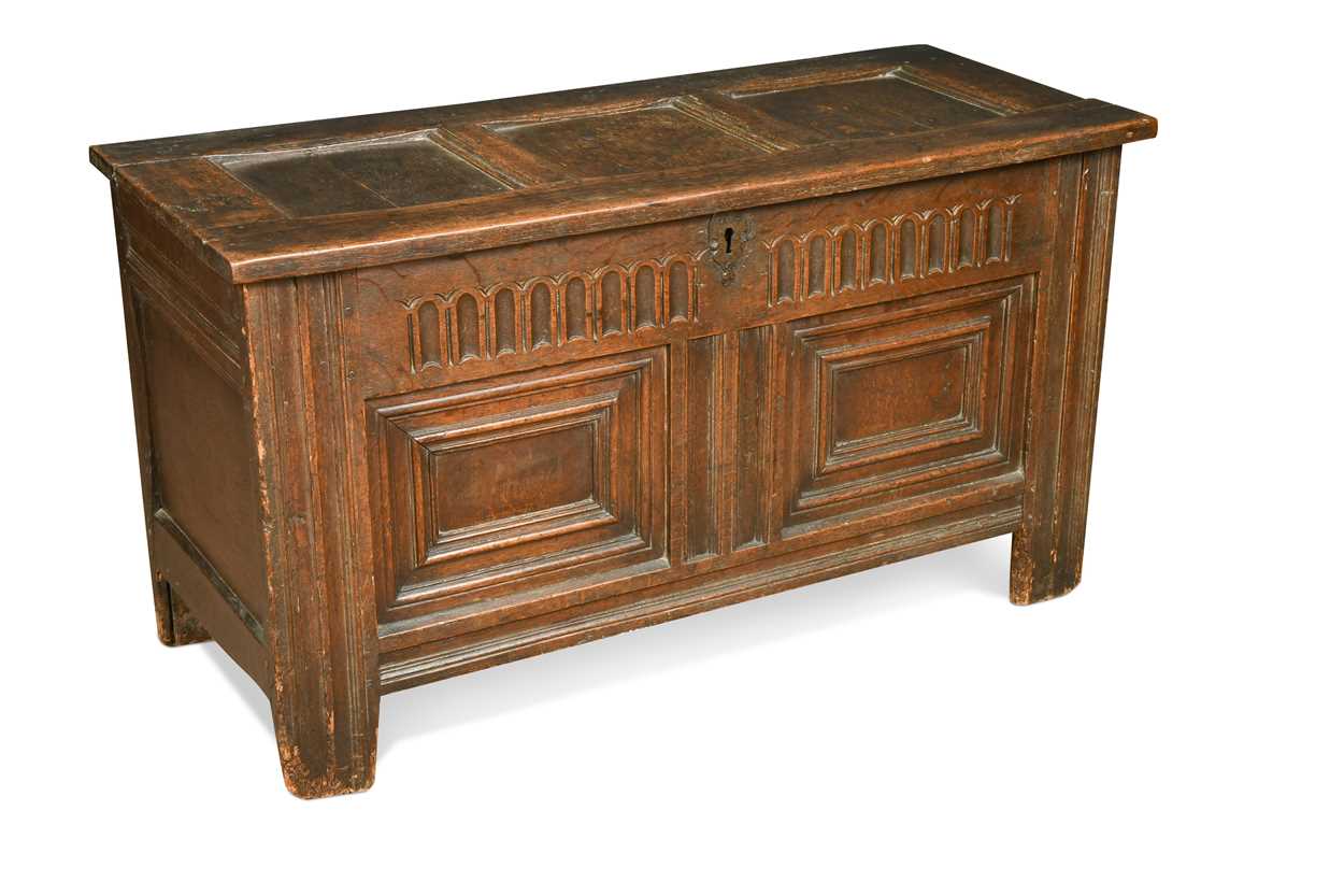 Lot 10 - An oak panelled coffer, 17th century