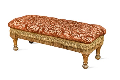 Lot 18 - A button upholstered and giltwood long stool,  19th century