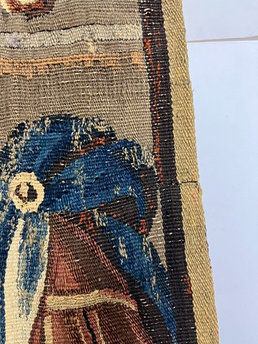 Lot 116 - A Flemish tapestry fragment, late 17th or early 18th century