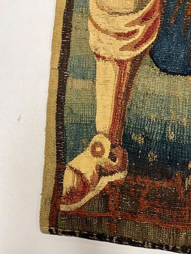 Lot 116 - A Flemish tapestry fragment, late 17th or early 18th century